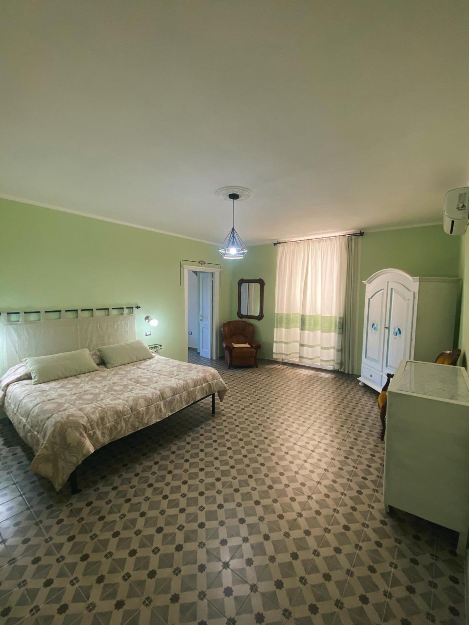 Tra I Due Ponti Hotel บอซา ภายนอก รูปภาพ