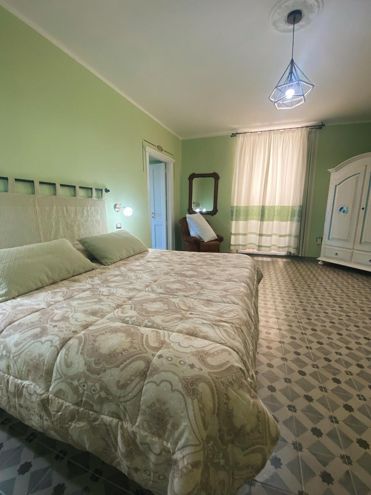 Tra I Due Ponti Hotel บอซา ภายนอก รูปภาพ